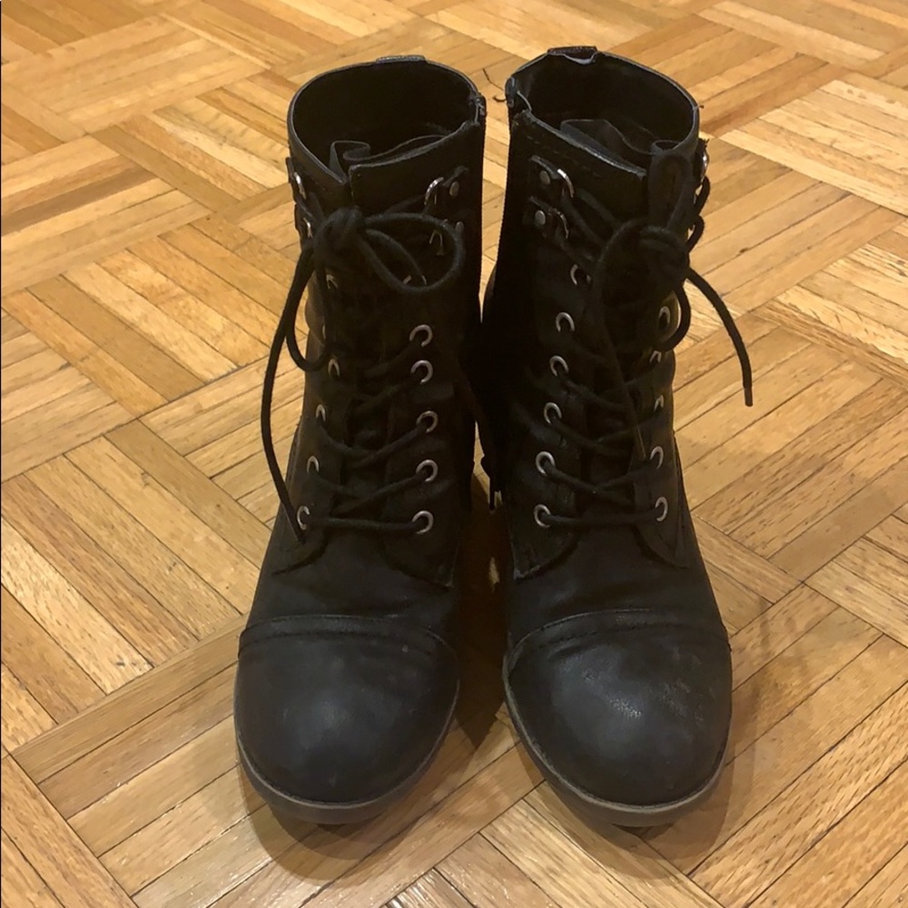 Well worn Madden Girl combat boots